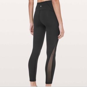 Black Lululemon leggings with side mesh